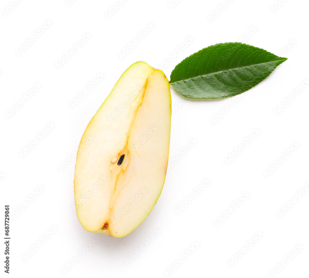 Piece of ripe pear with green leaf isolated on white background