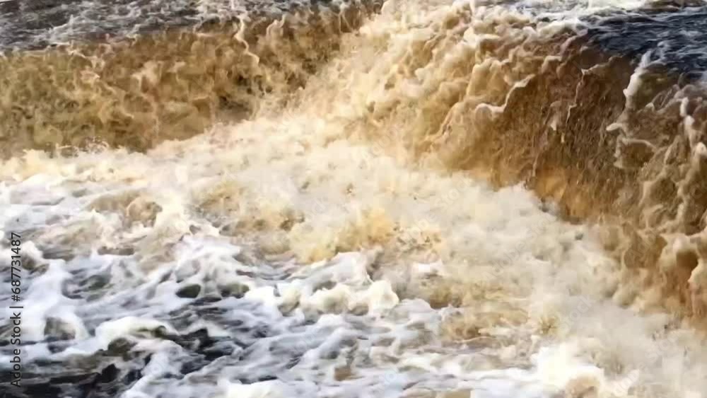 waterfall, mountain river collapses into a gorge, breaks, boils, close ...