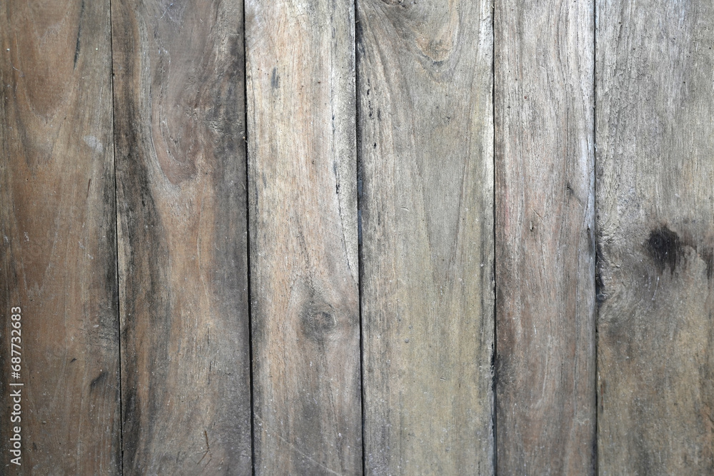 Naklejka premium The background is an old wooden floor with patterns from age and decay.