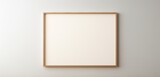 a subtle wooden frame highlights an empty canvas against a neutral background. The minimalist art mockup invites viewers to appreciate the beauty of understated elegance.