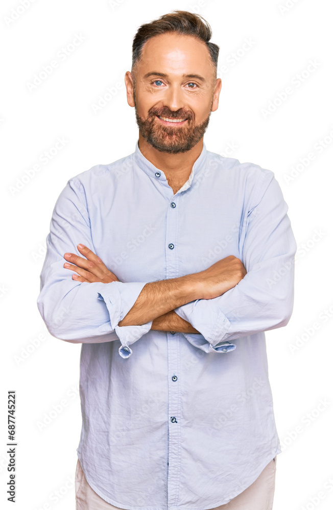 Handsome middle age man wearing business shirt happy face smiling with crossed arms looking at the camera. positive person. Handsome middle age man wearing business shirt happy face smiling with crossed arms looking at the camera. positive person.