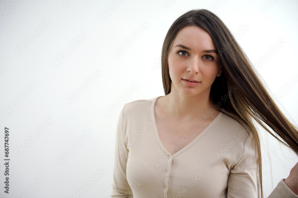 Obraz premium woman brush her long hair. High quality photo