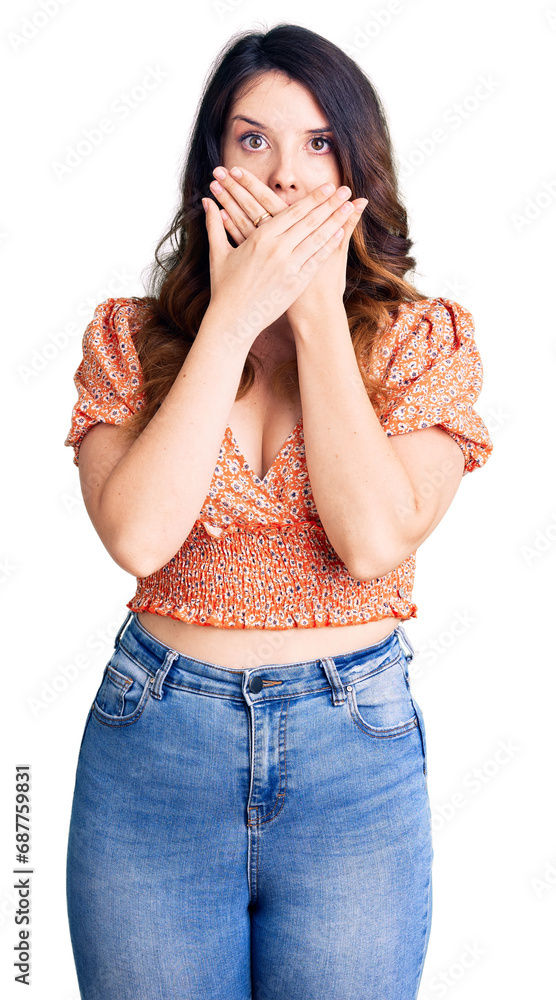 Beautiful young brunette woman wearing casual clothes shocked covering mouth with hands for mistake. secret concept. Beautiful young brunette woman wearing casual clothes shocked covering mouth with hands for mistake. secret concept.