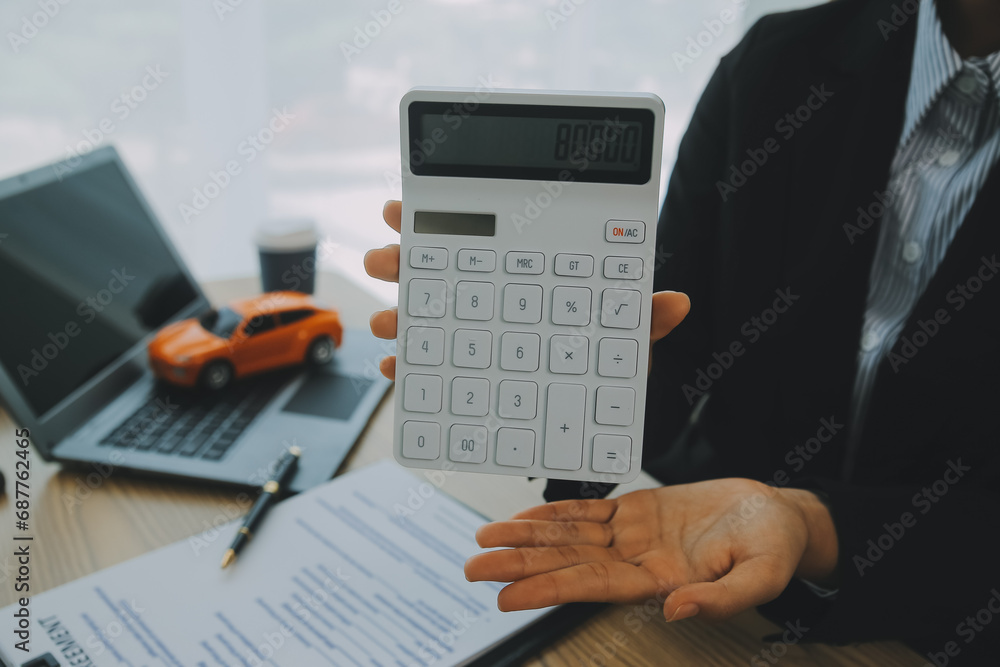 Salesman send key to customer after good deal agreement, successful car loan contract buying or selling new vehicle. Salesman send key to customer after good deal agreement, successful car loan contract buying or selling new vehicle.