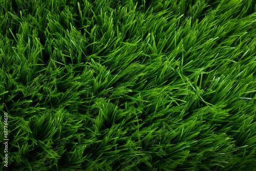 The close up landscape detail of lush green grass meadow or artificial grass in a football field texture surface, background and wallpaper. Generative AI.