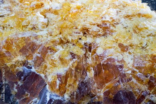 Amber semigem crystals geological mineral. Abstract texture background.