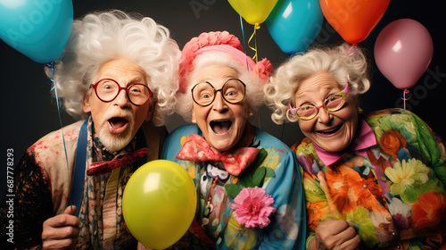 happy old people have fun in a birthday party