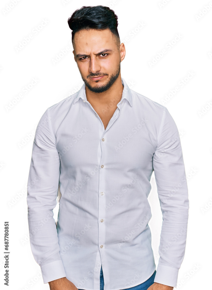 Young arab man wearing casual clothes skeptic and nervous, frowning upset because of problem. negative person. Young arab man wearing casual clothes skeptic and nervous, frowning upset because of problem. negative person.