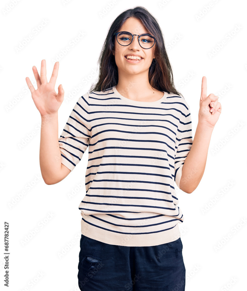 Brunette teenager girl wearing casual clothes and glasses showing and pointing up with fingers number six while smiling confident and happy. Brunette teenager girl wearing casual clothes and glasses showing and pointing up with fingers number six while smiling confident and happy.