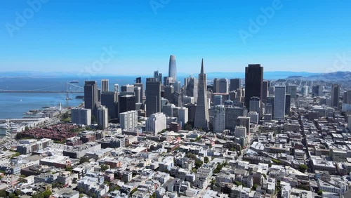 San Francisco Skyline and Bay Views. Drone footage of San Francisco's iconic skyline with Salesforce Tower and Bay Bridge. photo