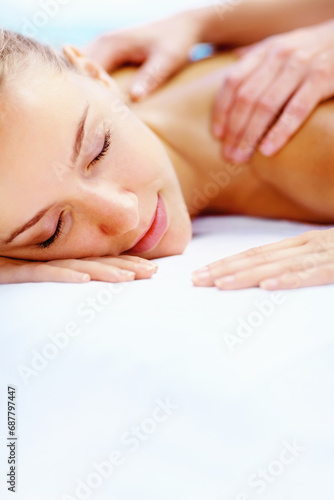 Spa, massage and health with woman, luxury resort and holiday with body care, treatment and relax. Person, happy and girl on a weekend break, calm and wellness with peace, stress relief and zen
