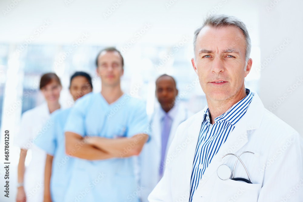 Doctor, man and portrait of expert with medical, healthcare and clinic staff in a hospital. Teamwork, leadership job and stethoscope of a nurse and surgeon with professional team ready for working Doctor, man and portrait of expert with medical, healthcare and clinic staff in a hospital. Teamwork, leadership job and stethoscope of a nurse and surgeon with professional team ready for working