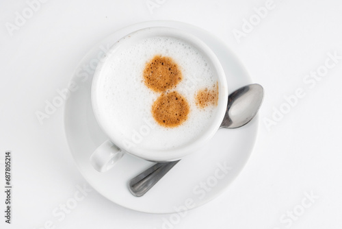 cup of cappuccino on the white