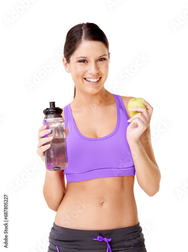 Woman, apple and water bottle in studio for healthy food choice, wellness and diet on a white background. Portrait of young model or vegan person with green fruit and liquid for detox or weight loss