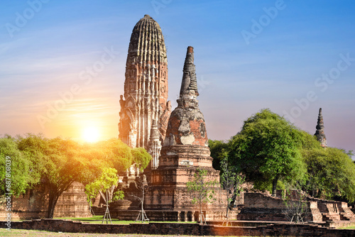 Ancient Pagoda in Ayutthaya Thailand at sunset sky background. Old temple buddha