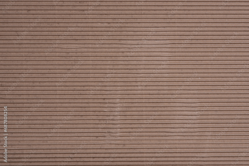 Carton or cardboard packing material. Texture of corrugated paper sheets made from cellulose. Supplies for creating boxes and packaging. Pasteboard background Carton or cardboard packing material. Texture of corrugated paper sheets made from cellulose. Supplies for creating boxes and packaging. Pasteboard background