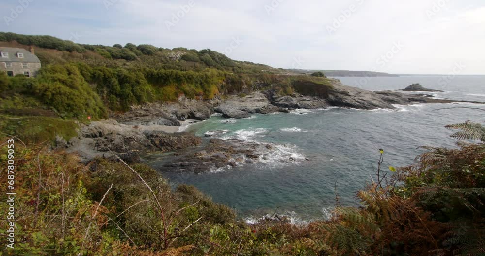 Extra Wide shot of the sea and rocks at Bessy's Cove, The Enys taken from the Coastal path, cornwall Extra Wide shot of the sea and rocks at Bessy's Cove, The Enys taken from the Coastal path, cornwall