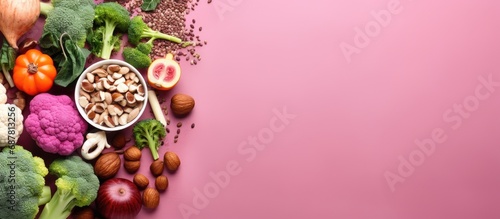 Brain-boosting foods on pink background. Energizing food and mental wellbeing. Healthy living. Space for text. Overhead view. Mindful eating plan. photo
