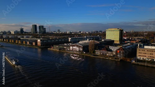 Wallpaper Mural Ships passing on IJ river next to Amsterdam Noord Vogelbuurt drone fixed shot Torontodigital.ca