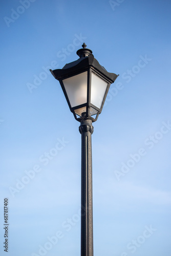 City lighting lamps on the street during the daytime © Prikhodko