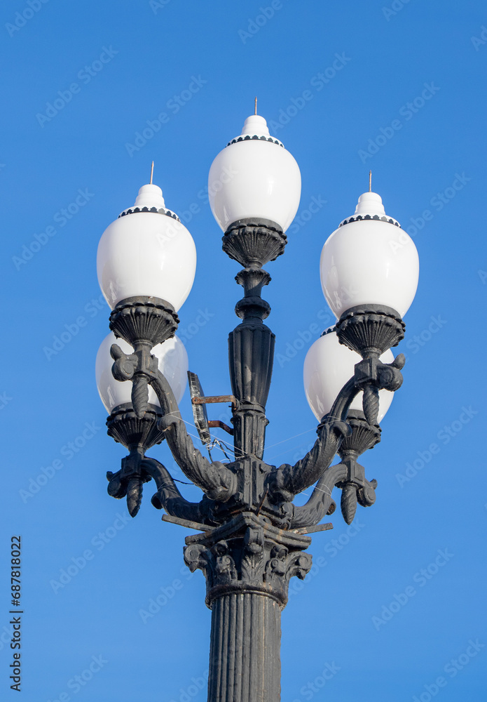 City lighting lamps on the street during the daytime