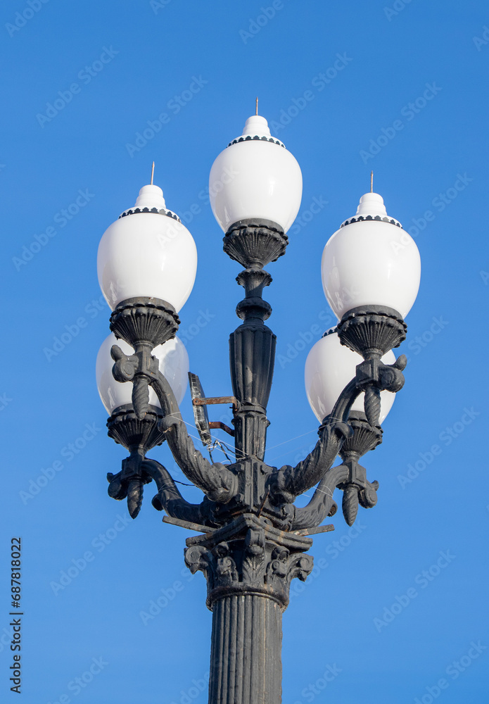 City lighting lamps on the street during the daytime City lighting lamps on the street during the daytime