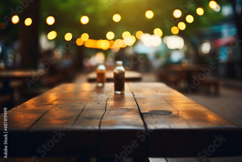 Wooden table with variety of bottles of beer. Perfect for bar and brewery advertisements.
