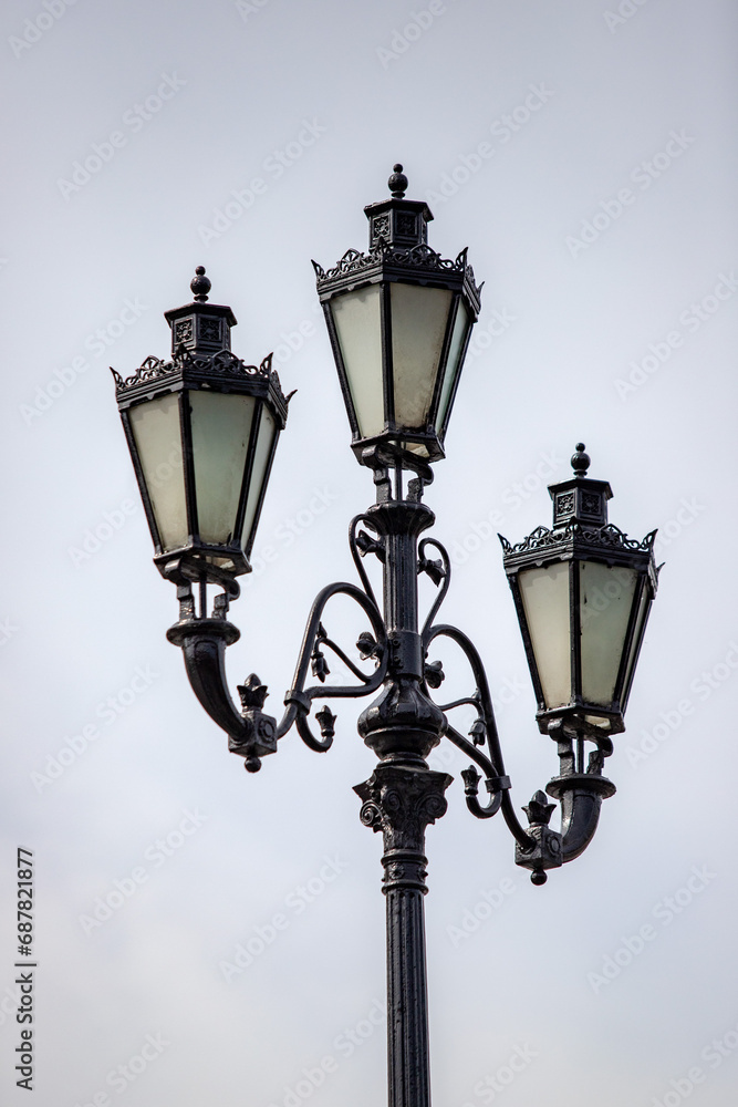 City lighting lamps on the street during the daytime