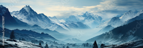 Vast panoramic image of a majestic snow-covered mountain range with snow-covered landscape in the foreground