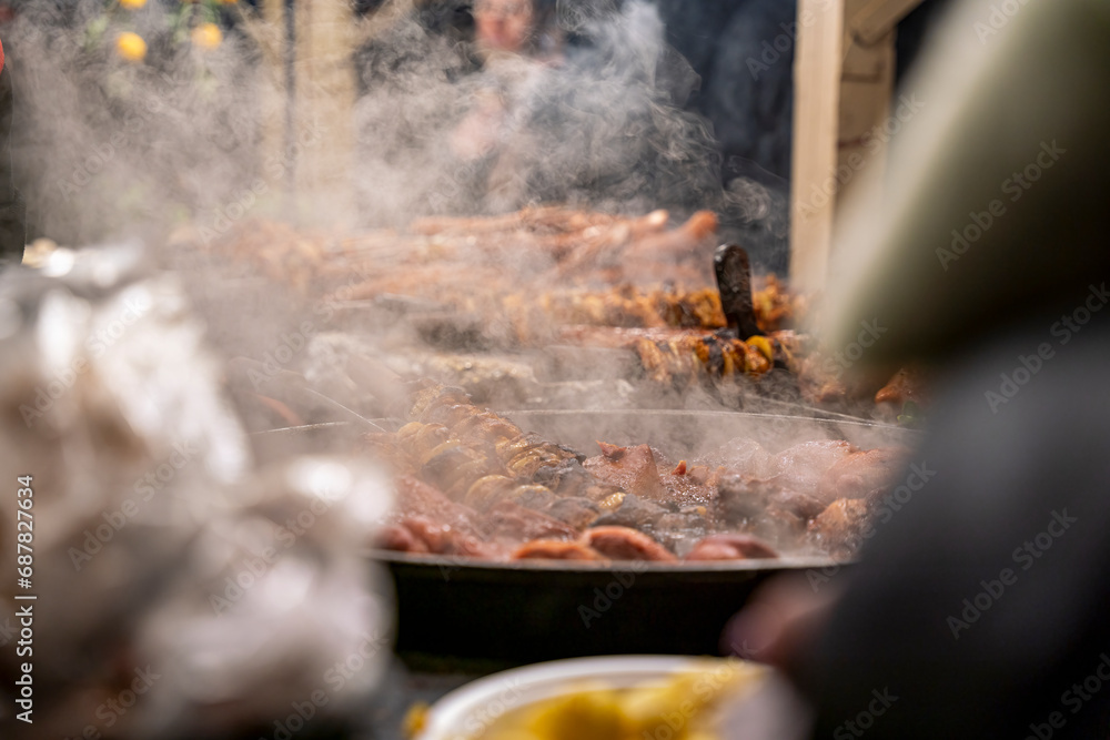 Krakow Christmas Market with fresh grilled food Krakow Christmas Market with fresh grilled food