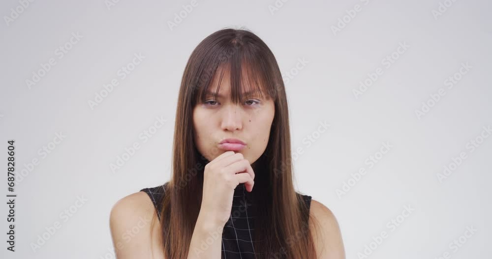 Woman, thinking and question in studio idea search mockup space, brainstorming or decision plan. Asian person, finger and why stress problem solving on white background remember, confused or memory Woman, thinking and question in studio idea search mockup space, brainstorming or decision plan. Asian person, finger and why stress problem solving on white background remember, confused or memory