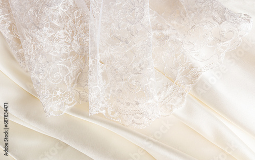 Part of the delicate bridal tulle of the bride and delicate pleats of satin in cream, beige, champagne color. design. mockup