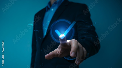Businessman use smartphone and virtual correct sign or tick mark, five stars, hand shows sign of top service Quality assurance, service experience, show the standards of products.