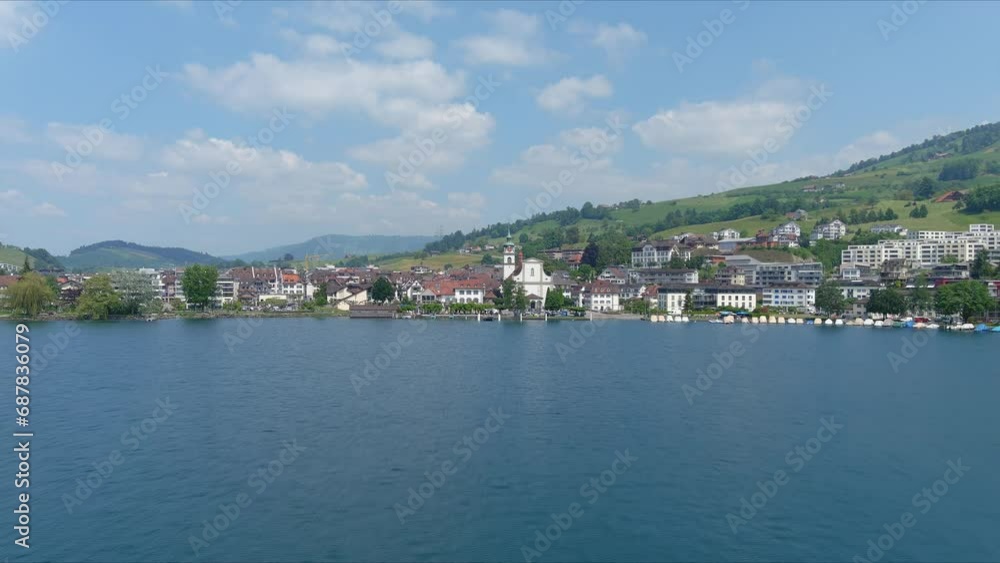 Kussnacht Flyover: Moving Over Scenic Water Valley and Village in Alps Mountains, Switzerland, Europe, Drone | Dramatic Cinematic Reversing Shot of Small Village City Along Vast Lake and Countryside Kussnacht Flyover: Moving Over Scenic Water Valley and Village in Alps Mountains, Switzerland, Europe, Drone | Dramatic Cinematic Reversing Shot of Small Village City Along Vast Lake and Countryside