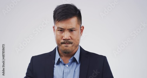 Angry, businessman or face with stress in studio on white background with burnout, anxiety or disaster. Profile, risk or dissapointed male person frustrated by an anger problem, mistake or loss photo