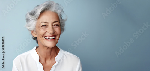 Mature old lady close up portrait. Beauty healthy facial skin care. dental service advertisement.
