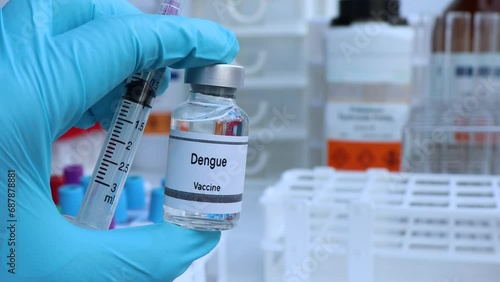 Dengue vaccine in a vial, immunization and treatment of infection, scientific experiment photo