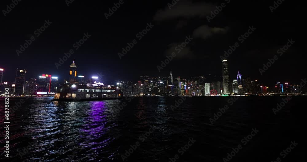 Hong Kong-November 15, 2023- Victoria Harbour is a beautiful sight in the evening. The synchronized light and laser show entertains visitors watching from Kowloon side. Hong Kong-November 15, 2023- Victoria Harbour is a beautiful sight in the evening. The synchronized light and laser show entertains visitors watching from Kowloon side.