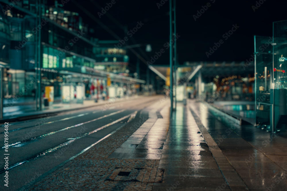 City street at night with illuminated buildings and transportation. City street at night with illuminated buildings and transportation.
