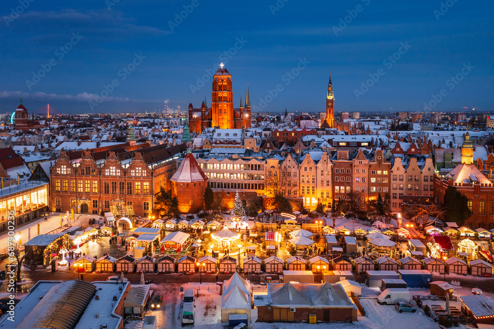 Beautifully lit Christmas market in the Main City of Gdansk at dawn. Poland