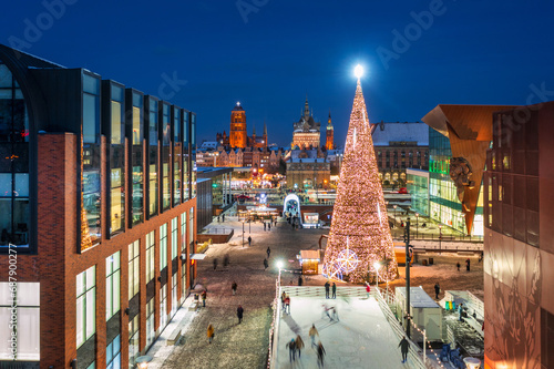 Aerial view of the beautiful main town of Gdansk with festive Christmas tree in winter, Poland