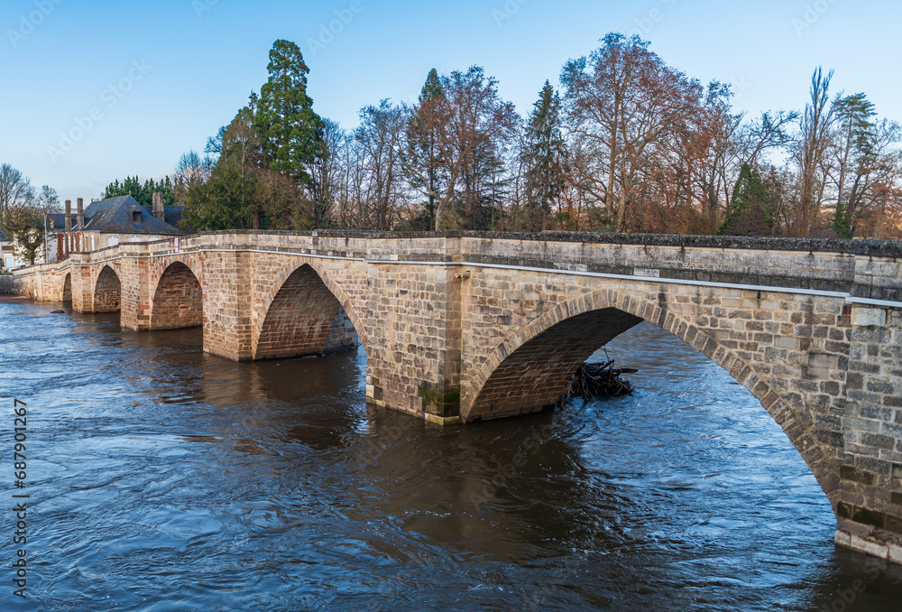 Naklejka premium The old bridge over the Vézère at Terrasson Lavilledieu in Dordogne, Nouvelle Aquitaine, France