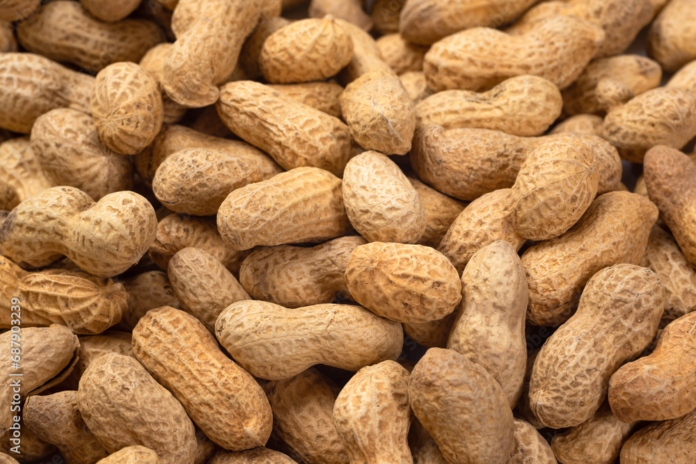Food background of peanuts in shell, top view. Heap of fresh peanuts Food background of peanuts in shell, top view. Heap of fresh peanuts