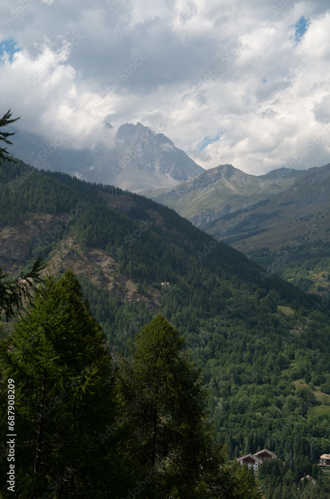 Alpine panorama near Bardonecchia with cloudy skies in the distance