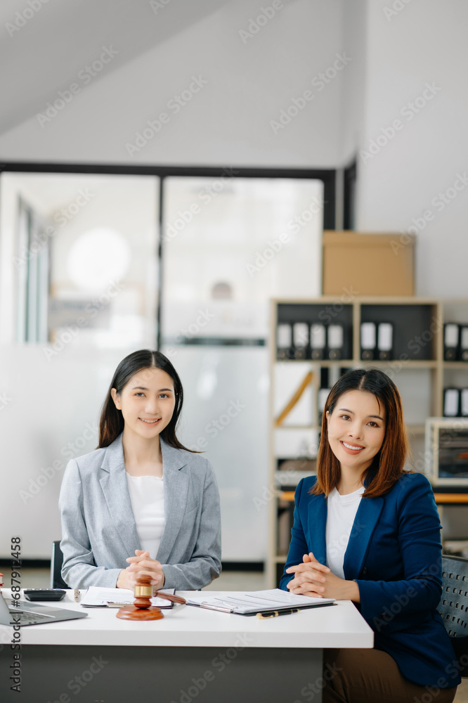 business people and lawyers discussing contract papers sitting at the table. Concepts of law, advice, legal services. business people and lawyers discussing contract papers sitting at the table. Concepts of law, advice, legal services.
