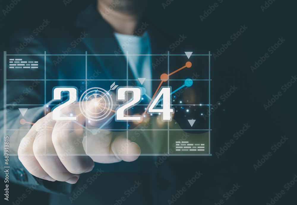 Businessman analyzes business growth plan in 2024, digital marketing strategy, revenue, profit, economy, stock market and business trends. Technical Analysis Strategies Using Future AI Technology Businessman analyzes business growth plan in 2024, digital marketing strategy, revenue, profit, economy, stock market and business trends. Technical Analysis Strategies Using Future AI Technology