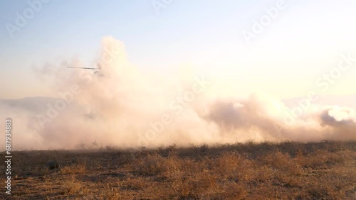 Israeli Blackhawk Helicopter landing in Gaza on field designated by smoke photo