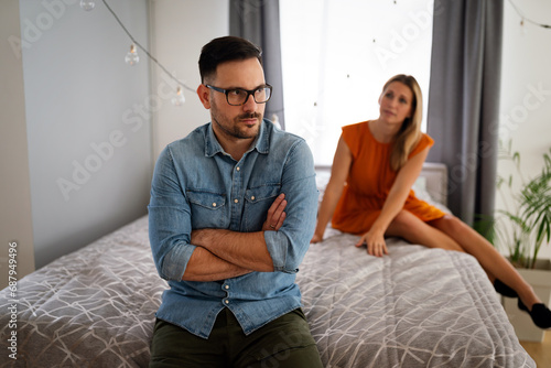 Frustrated young couple arguing and having marriage problems. Divorce conflict people concept