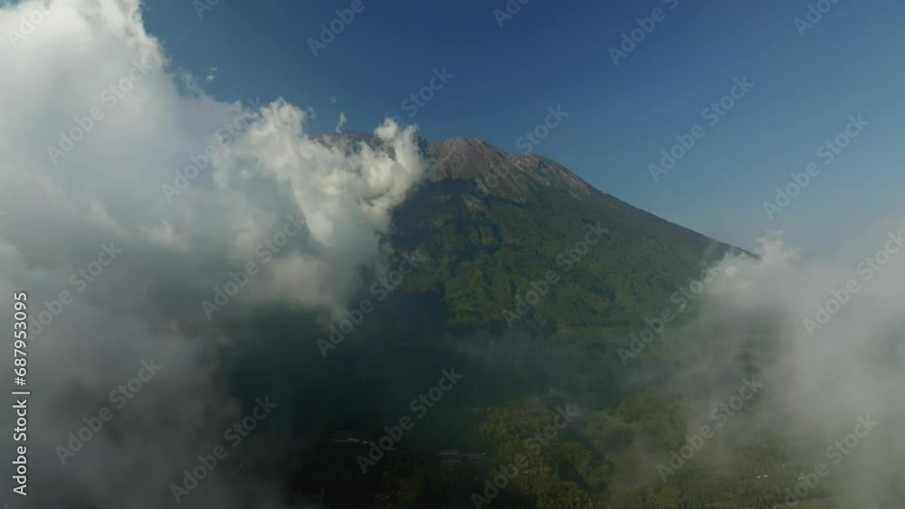 Agung volcano with clouds. Drone view of Bali. Agung volcano with clouds. Drone view of Bali.