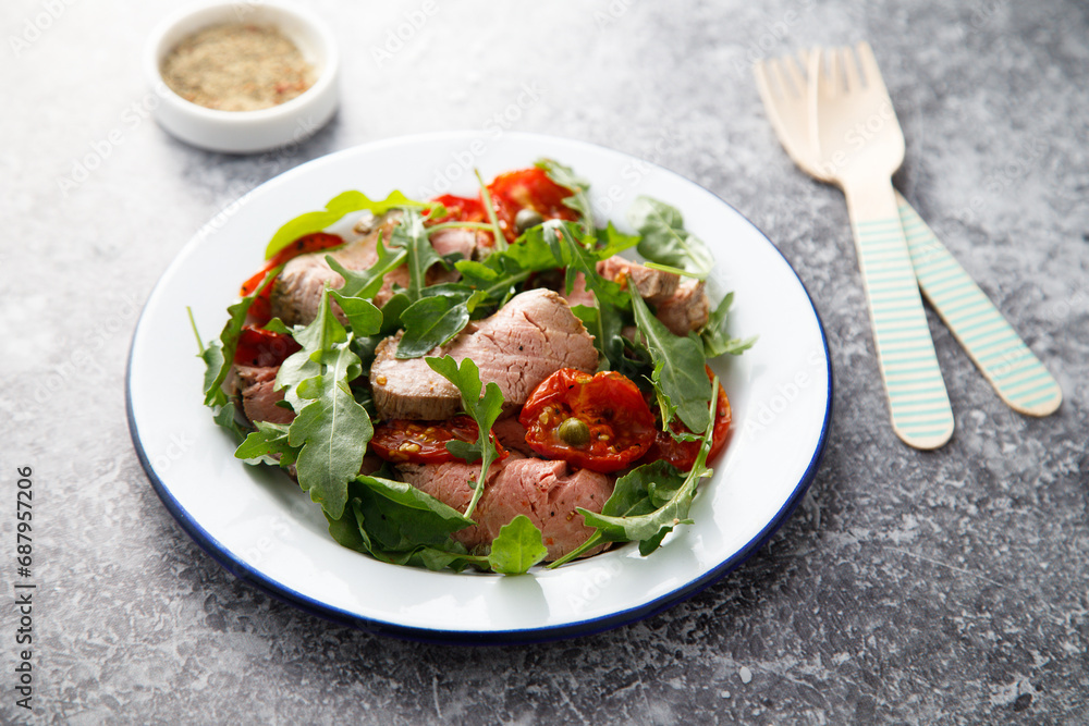 Arugula salad with roast beef and tomatoes Arugula salad with roast beef and tomatoes